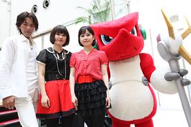 Shoutmon mascot with singers Twill & Wada Koji
